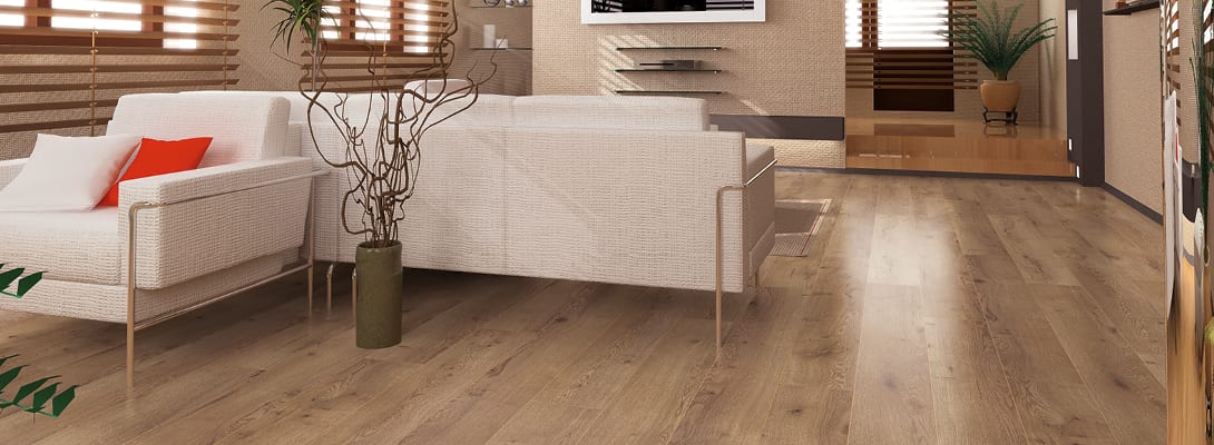 Zona giorno con pavimento laminato effetto rovere dalle venature naturali